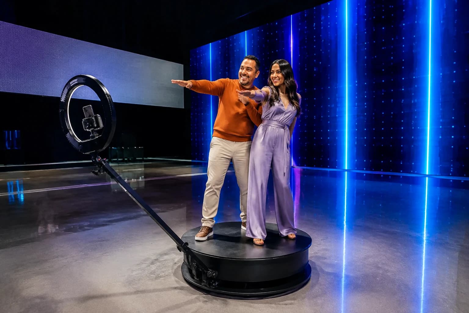 Guests on an OrcaVue-style 360 platform in a futuristic technology launch environment