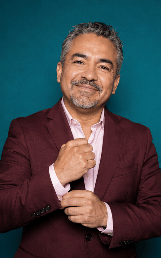 Animated GIF booth loop of a Latino man in his fifties making four charismatic poses against a teal backdrop